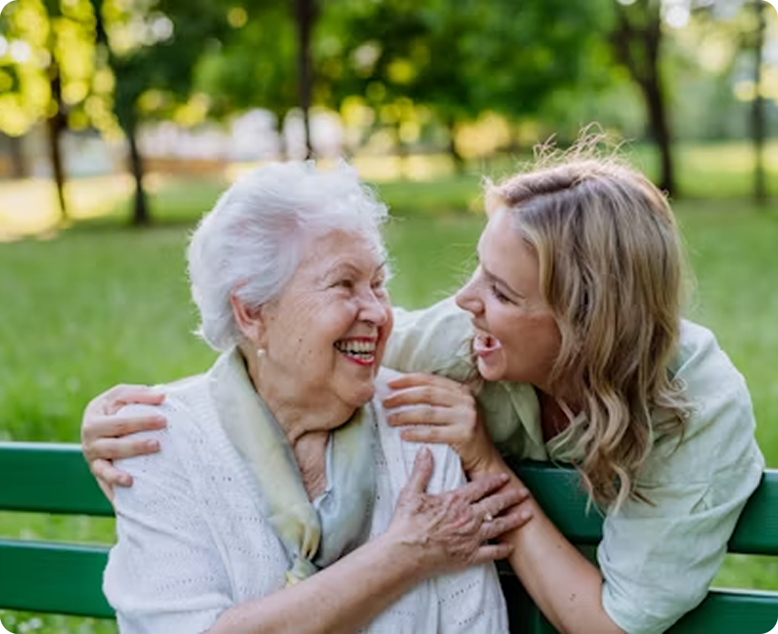Elderly woman with caregiver